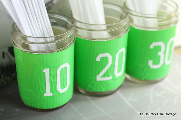 Mason jar utensil holder for any football party including the Super Bowl!