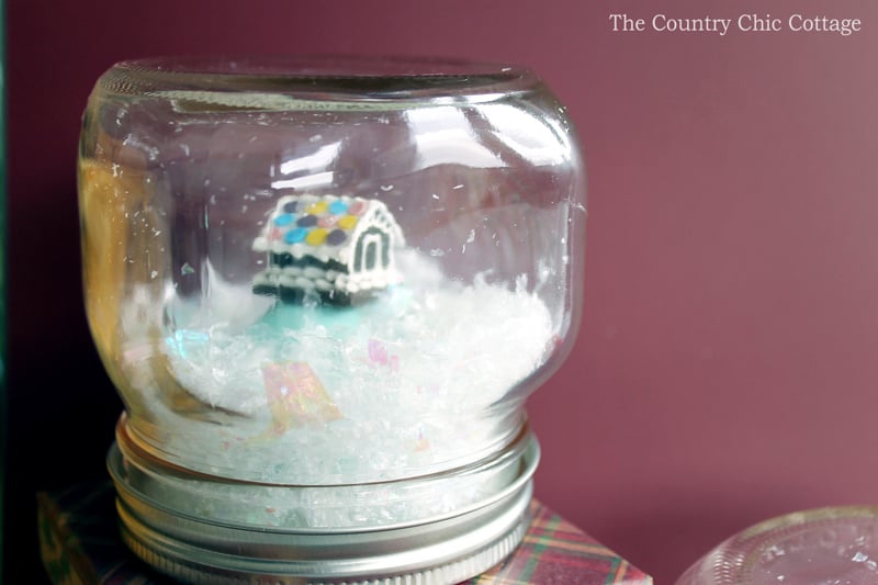 Make an EOS lip balm snow globe as a gift this holiday season! Everyone will love these Christmas gifts!