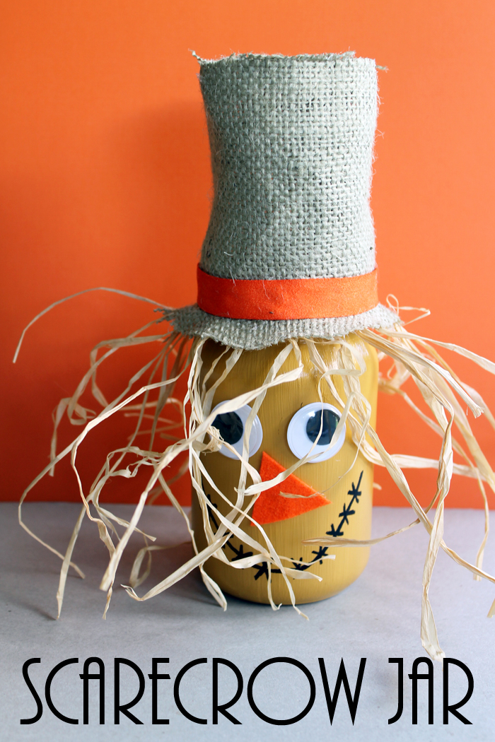 Make this scarecrow jar fall craft idea for your autumn home! A fun craft that the kids will love to help with!