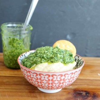 Making pesto with basil! Top hummus for an amazing snack!