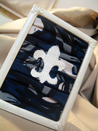 Make this framed fleur-de-lis with items you have around your home! Great french inspired home decor!