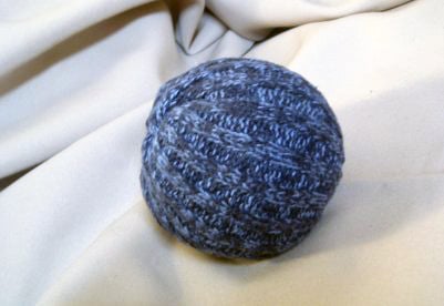 Make a decor ball from an old sweater! A fun recycled craft idea!