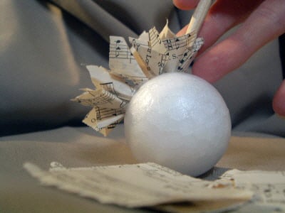 Make this sheet music ball for your home! You will love this easy to make home decor ball made with vintage sheet music!