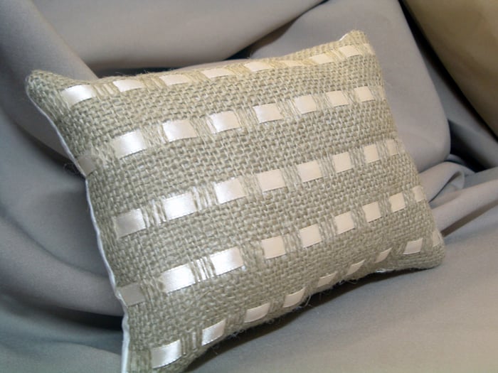 Make these burlap and ribbon pillows for your home with this craft tutorial. A fun way to get the Pottery Barn look in your home!