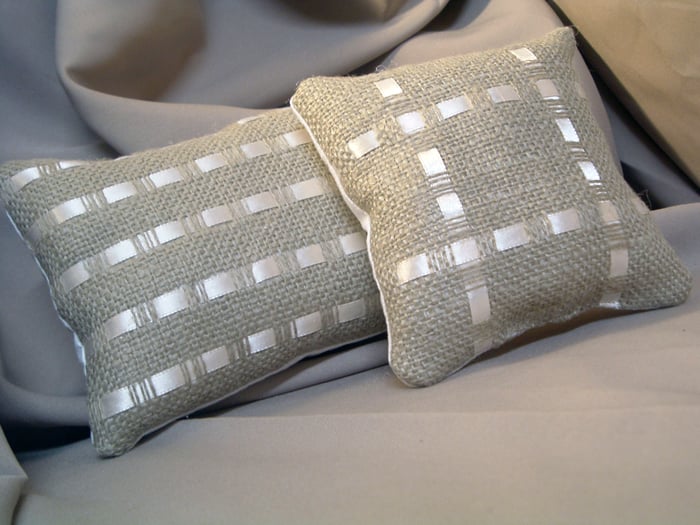 Make these burlap and ribbon pillows for your home with this craft tutorial. A fun way to get the Pottery Barn look in your home!