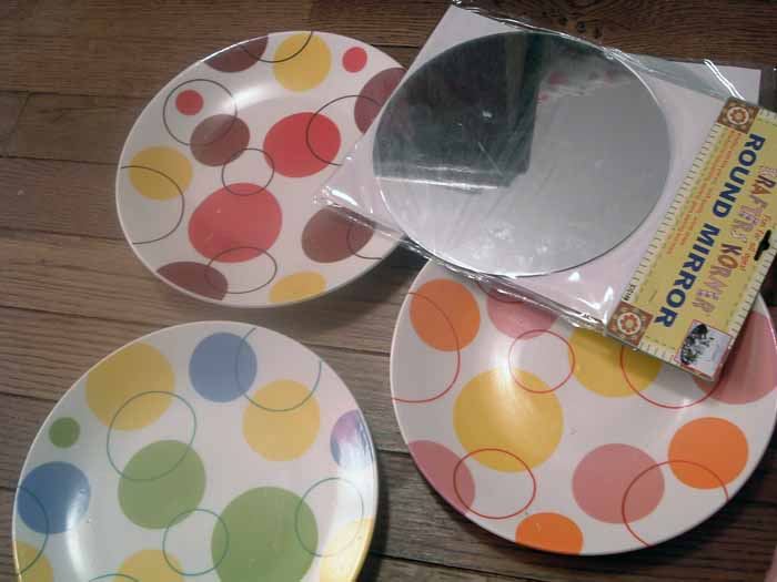 plates and round mirrors for hanging