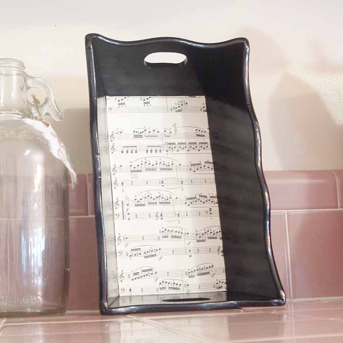 black tray with decoupaged sheet music