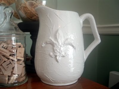 Emboss a pitcher with a hot glue gun to turn trash into treasure!