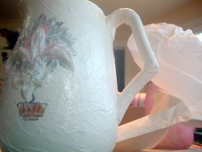 Emboss a pitcher with a hot glue gun to turn trash into treasure!