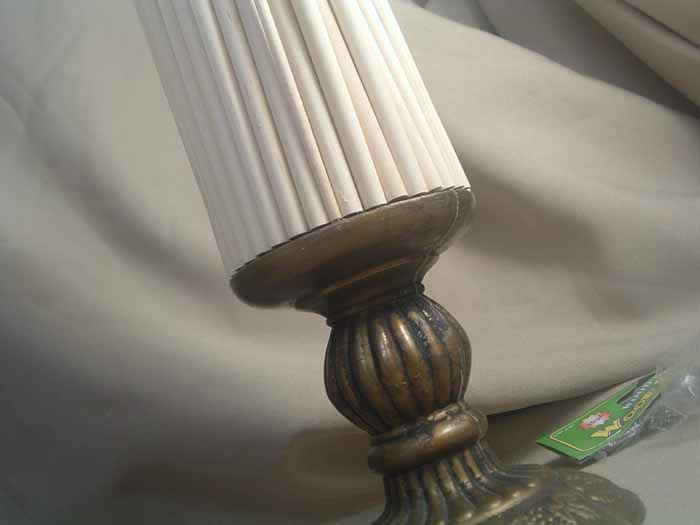 Make your own candlesticks using wood dowels and a few thiftstore finds! Gorgeous home decor for cheap!