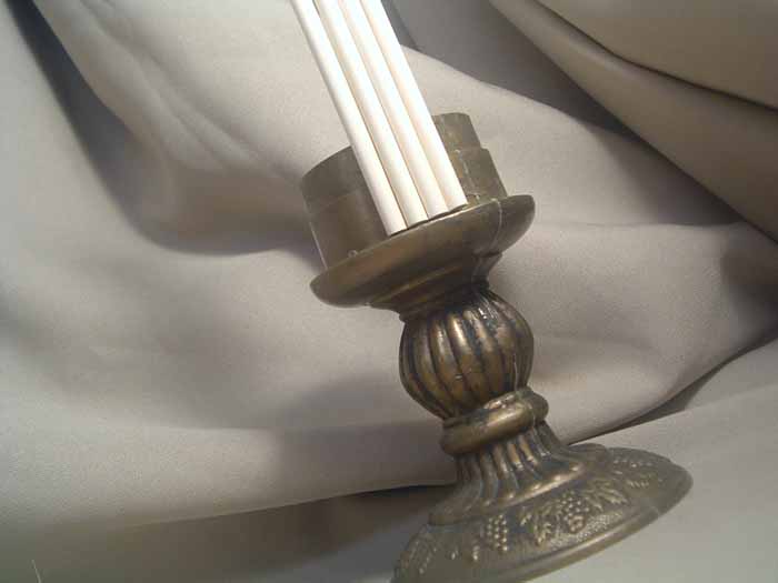 Make your own candlesticks using wood dowels and a few thiftstore finds! Gorgeous home decor for cheap!