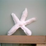 Make a shabby starfish from scrap fabric for your nautical or beach themed home!