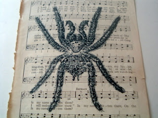 vintage sheet music with halloween spider