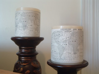 map wrapped candles on pillars