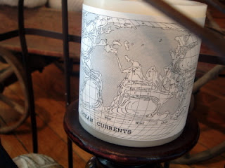 close up view of a map wrapped candle