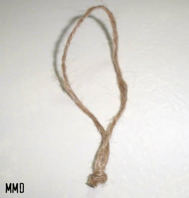 loop of jute on white backdrop