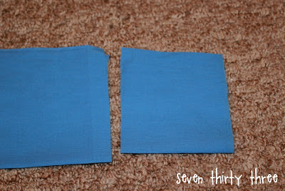 blue fabric pieces on carpet