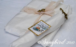 gift wrapped with tissue paper and tea stained ribbon