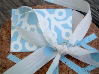blue and white gift card tied to gift