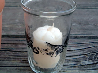 stenciled stamping on glass with votive inside