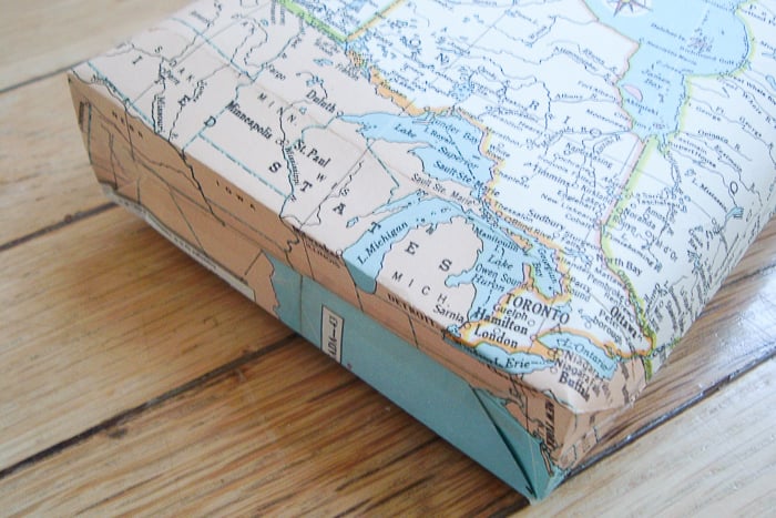 taping bottom of paper gift bag
