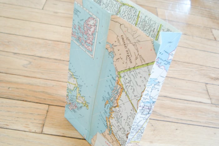 upcycing old map into gift bag