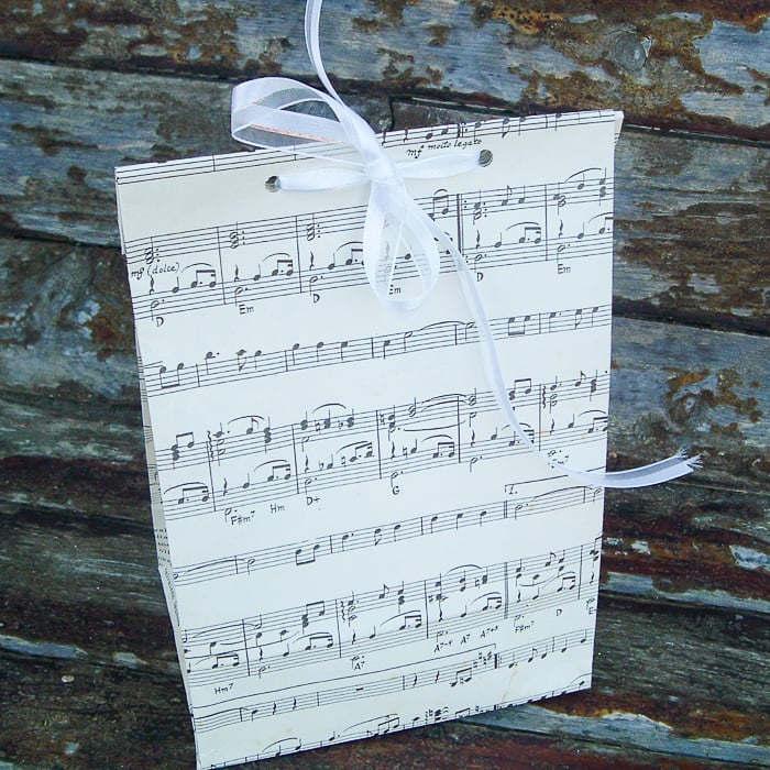 Using sheet music to make a DIY gift bag.