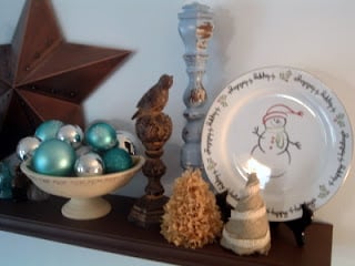 shelf with aqua and silver ornaments
