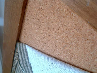 peeling fabric off of cork board