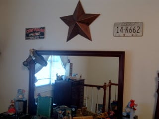 barn star above dresser mirror