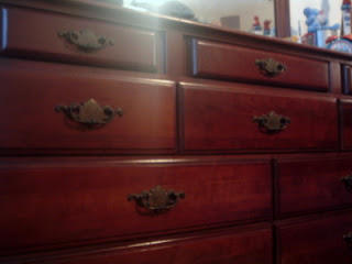 close up of wooden dresser drawers