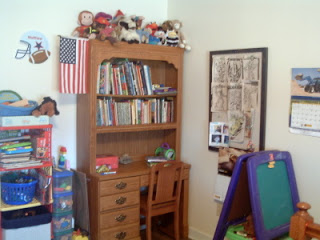 wooden desk with shelves in little boys room
