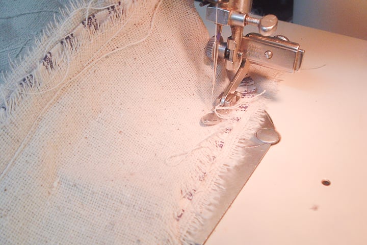 sewing cording on a pillow