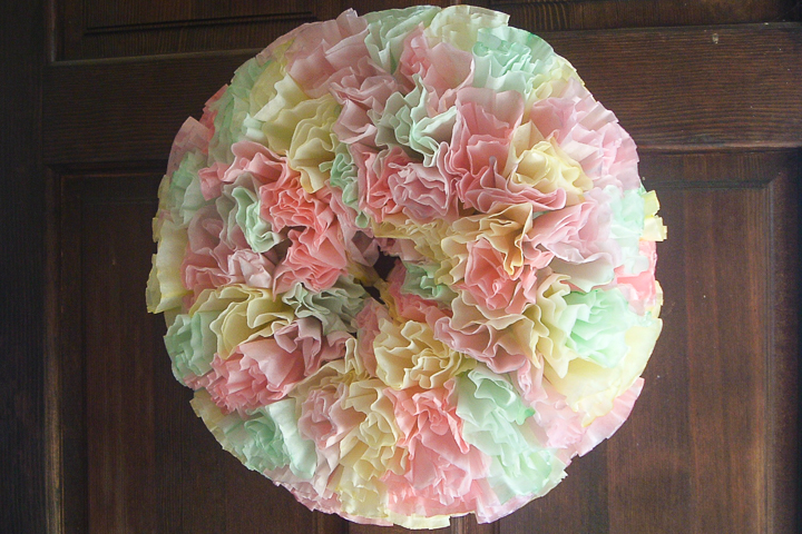 This coffee filter wreath is perfect for Spring, with lovely watercolored coffee filters