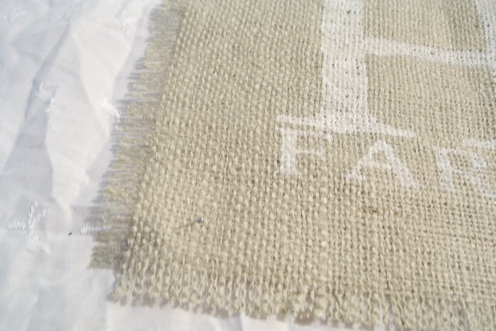 Attach the burlap to a piece of lace fabric, which will create the pillow cover