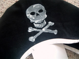 painted skull and crossbones on pirate hat
