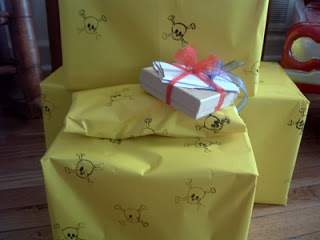 stacked yellow gift wrapped gifts