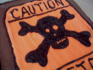 orange skull and crossbones cake