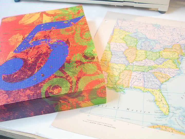 canvas and map on a table