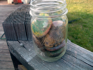 mason jar with painted rocks