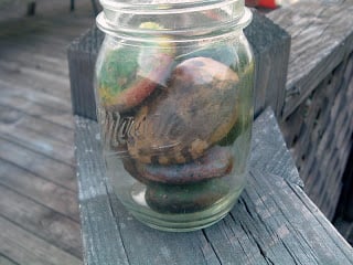 vintage mason jar with crayon painted rocks