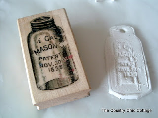 stamping a mason jar on polymer clay