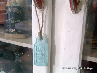 mason jar tag hanging from cabinet knob