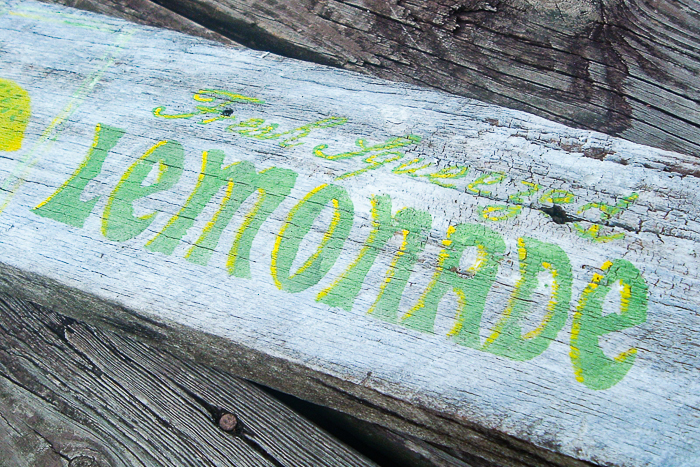Complete lemonade sign on weathered barn wood