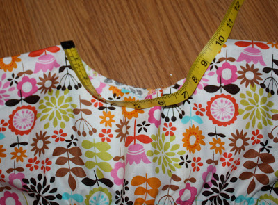 measuring tape on floral fabric