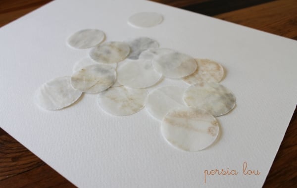 faux capiz shells on a piece of paper