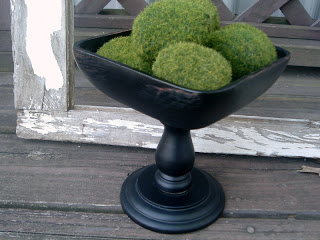 DIY wood pedestal bowl with green moss spheres