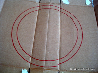 Tracing plates to make two circles on cardboard