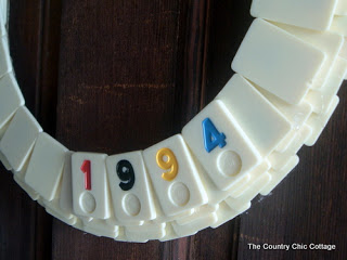 Attaching special number Rummikub tiles to a wreath form 
