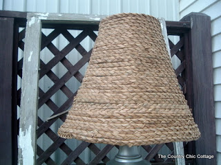 seagrass lampshade in front of lattice